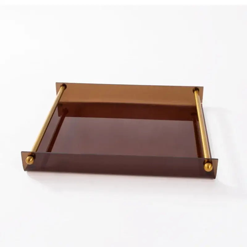 Modern amber acrylic fruit plate tray in brown translucent with gold toned brass handles for dining room use