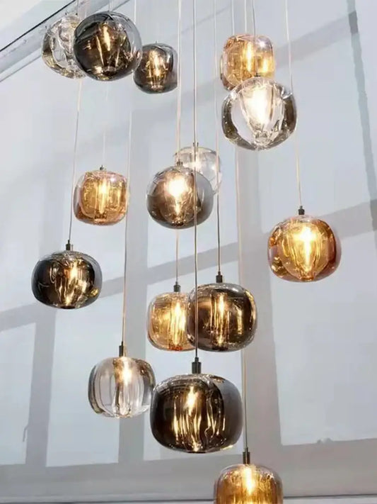 Modern amber and gold crystal led ceiling chandelier with textured spherical glass orbs for living room decorbites crystal led