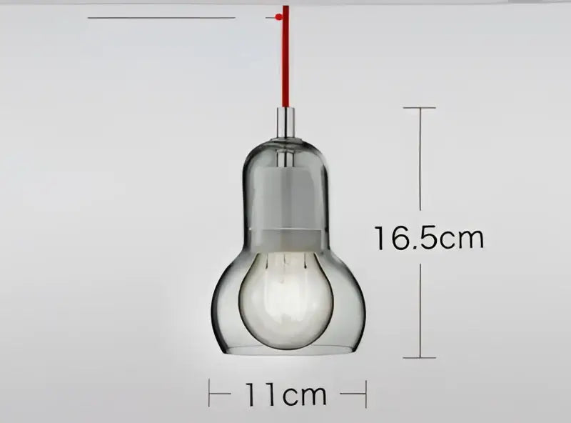 Modern clear glass pendant light with red cord and metallic fixture for dining room glass pendant lights