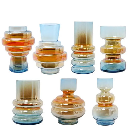 Set of seven decorbites gradient glass vases in amber blue and clear with stacked rounded tiers for living room decor