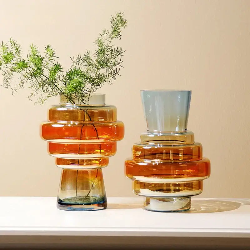 Stacked amber and translucent decorbites gradient glass vases with layered ring segments for modern living room decor