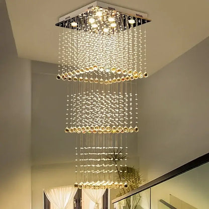 Modern amber and clear decorbites crystal teardrop stairwell chandelier with cascading beads and metallic frame
