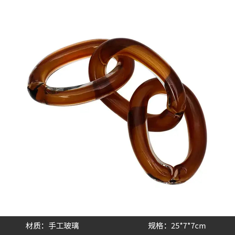 Hand-blown amber glass chain with glossy translucent finish and smooth rounded links for colorful geometric ring decor