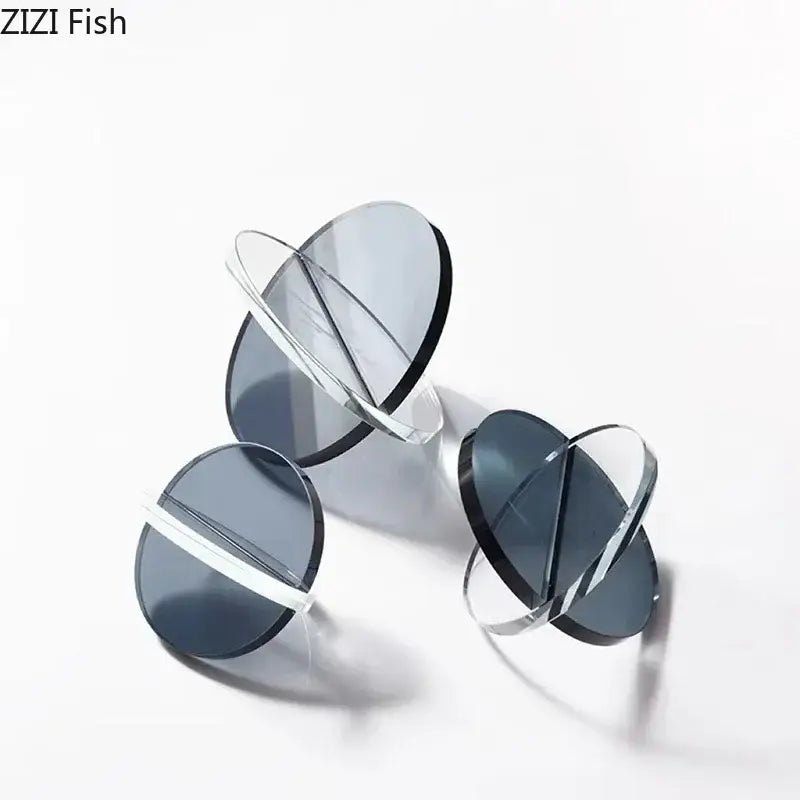 Modern amber geometric cross ornaments living room bookends with dark gray transparent lens blanks and clear plastic frames