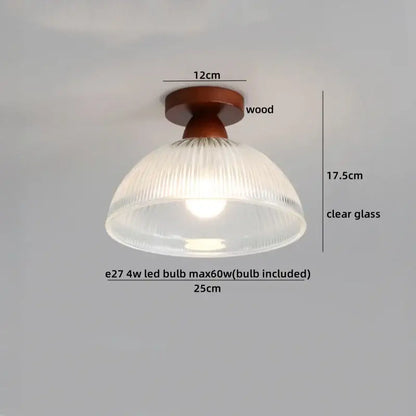 Modern amber glass and brass led ceiling lamp with warm-toned wooden fixture and clear ribbed glass shade for dining room