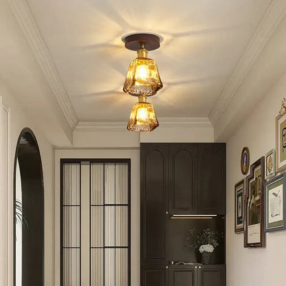 Modern amber glass and brass led ceiling lamp with two stacked textured shades for dining room lighting
