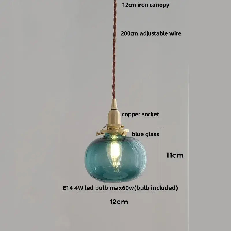 Modern amber glass ball pendant light featuring a round blue glass ball led with copper socket for dining room lighting