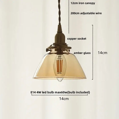 Vintage-style pendant light with amber glass ball led shade, copper socket, and 12cm iron canopy for dining room