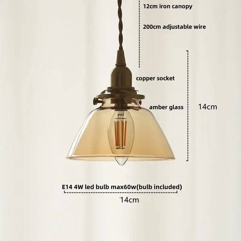 Vintage-style pendant light with amber glass ball led shade, copper socket, and 12cm iron canopy for dining room