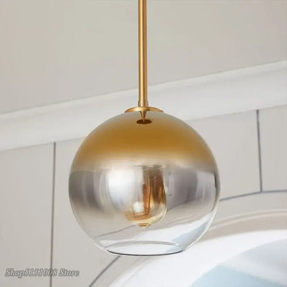 Modern amber glass ball led pendant light with gold and clear gradient glass ball led and brass-finished rod decorbites pendant light