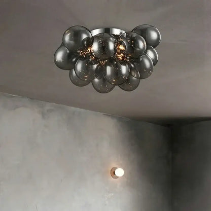 Modern ceiling lamp featuring translucent gray glass spheres in a spherical formation for bedroom lighting