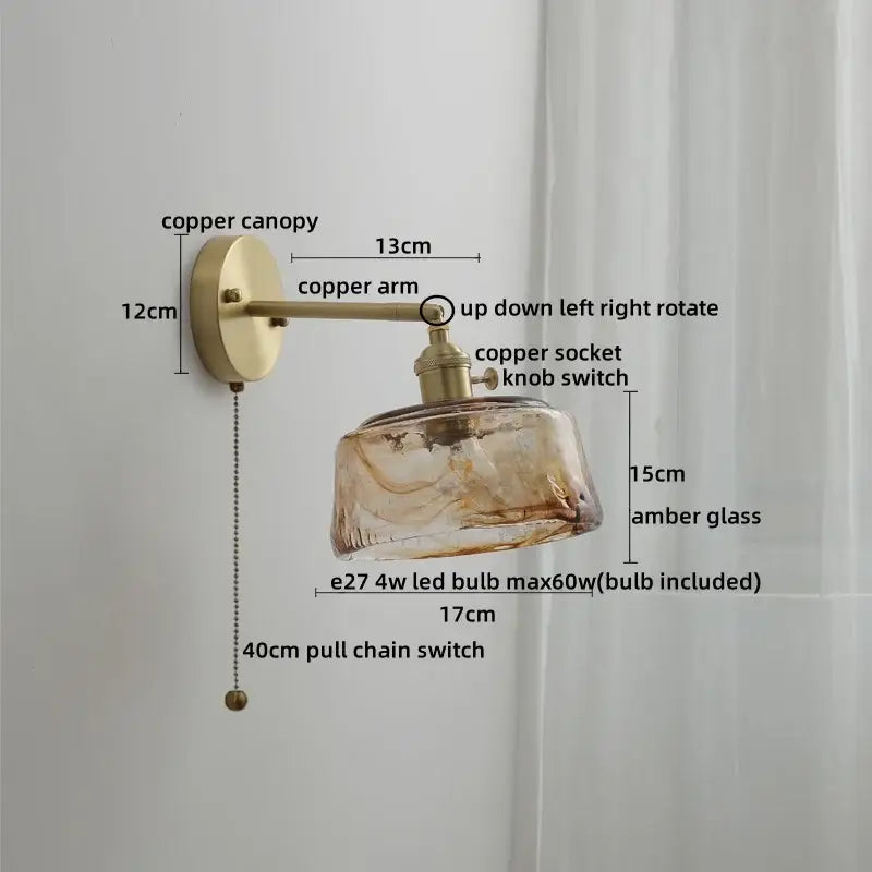 Antique brass-finished wall lamp with textured amber glass copper led shade and adjustable copper led wall arm for bedroom