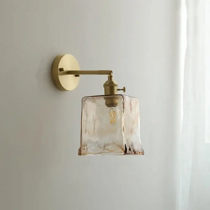 Modern amber glass copper led wall lamp with brass finish and textured translucent shade for bedroom sconce lighting