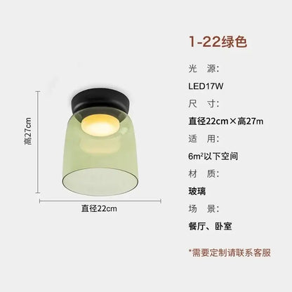 Modern amber glass led ceiling light with sleek translucent green glass and warm yellow illumination for living room