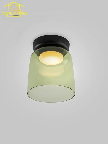 Modern amber glass led ceiling light with matte black base and translucent olive-green shade for living room ceiling light