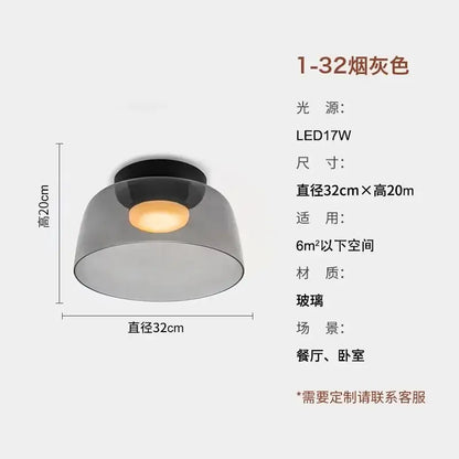Modern amber glass led ceiling light with smoked glass pendant and black base for dining or bedroom spaces