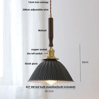 Black ribbed glass led pendant lamp with walnut iron canopy and brass hardware for modern dining room decor