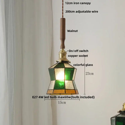 Modern amber glass led pendant light with geometric green and amber shade suspended from walnut wood handle
