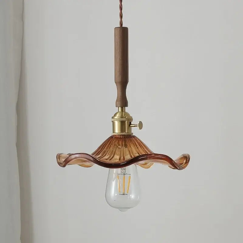 Modern amber glass led pendant light with warm amber glass, wooden handle, and brass hardware for dining room decorbites amber glass