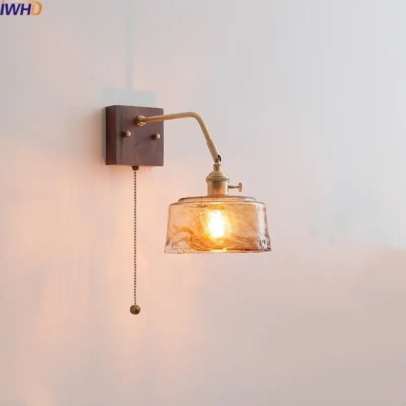 Modern amber glass led wall sconce with brass finish and textured hand-blown design for stylish bedroom decorbites led wall lighting