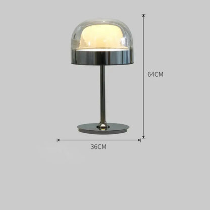 A modern amber glass pendant light with a copper finish featuring a sleek glass dome and polished chrome base