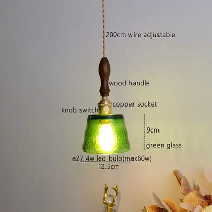 Modern amber glass pendant light with green textured glass, wooden handle, and copper socket for dining room decorbites amber pendant