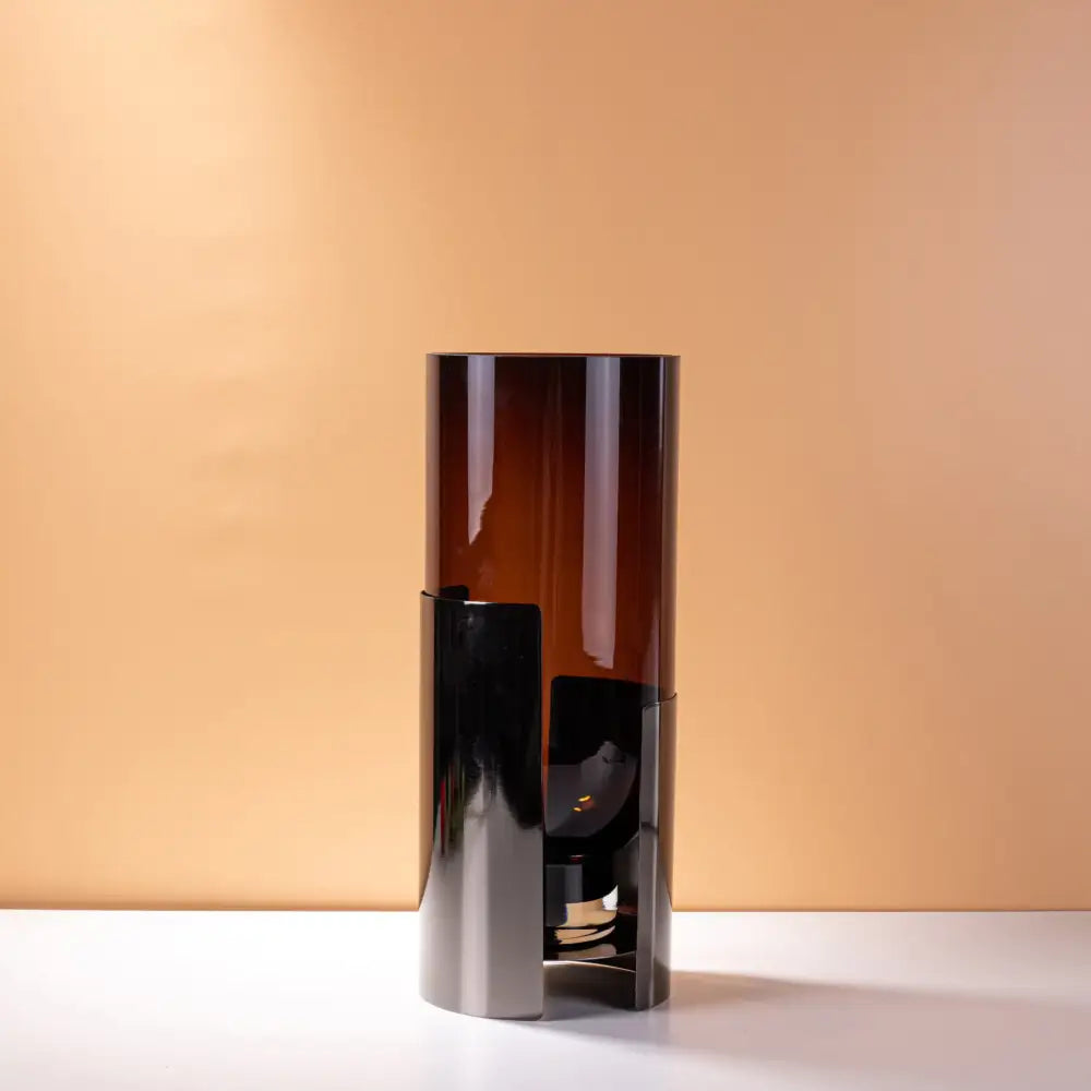 Modern amber glass vase set featuring a sleek table lamp with tall amber glass and polished black metal base decorbites amber glass