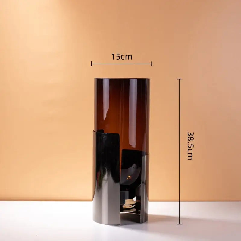Tall amber glass vase with sleek black metal base and silver accents for modern decorbites amber glass living room decor