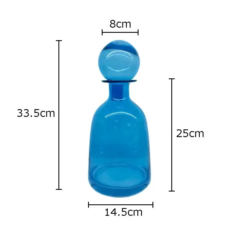 Translucent blue glass decanter with rounded spherical stopper from the modern decorbites amber glass vase trio hydroponic set