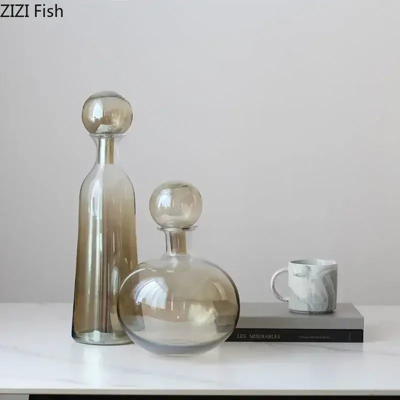 Tall slender amber glass vase with spherical stopper and reflective surface for modern decorbites amber glass hydroponics