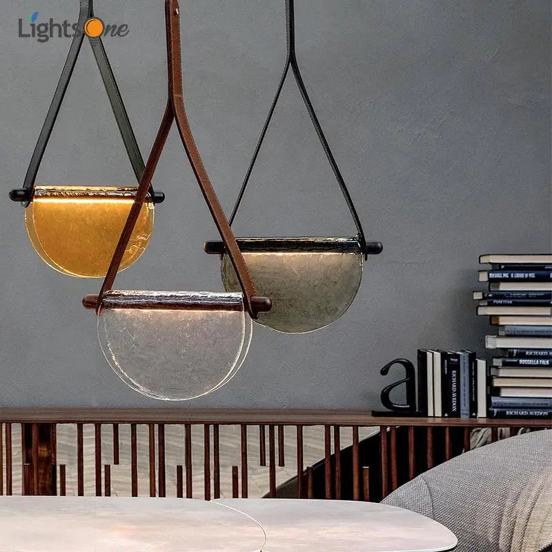 Modern amber and gray pendant lamp with handmade leather straps and glass shades for bedroom decorbites handmade leather