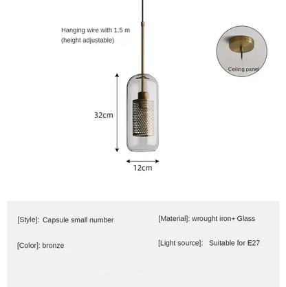 Bronze capsule-style pendant light with clear glass enclosure and perforated wrought iron shade for kitchen decorbites glass ball led