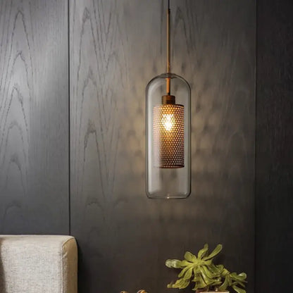 Modern amber honeycomb decorbites glass ball pendant light with clear glass enclosure and brass-toned fixture for kitchen