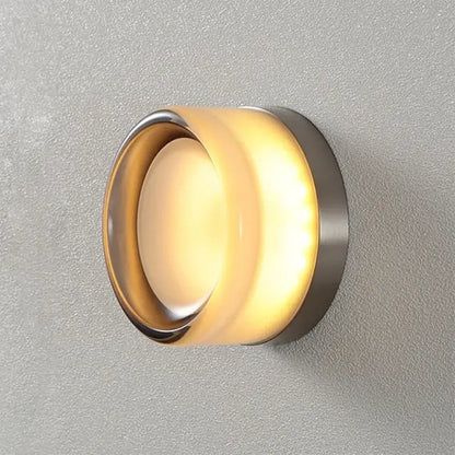 Modern amber jelly led wall sconce with warm-toned frosted glass diffuser and brushed metal frame for decorbites amber jelly