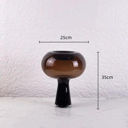 A modern amber and marble geometric glass vase with a glossy black stem flower arranger decorbites geometric glass decor