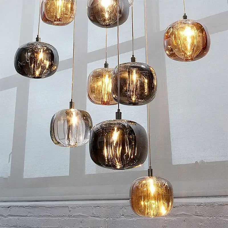 Modern amber and smoke crystal staircase chandelier with spherical glass pendant lights for living room lighting
