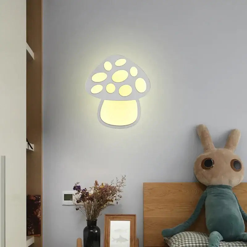 A soft yellow acrylic kids led wall light with circular spots and white outline for bedroom decorbites kids led use