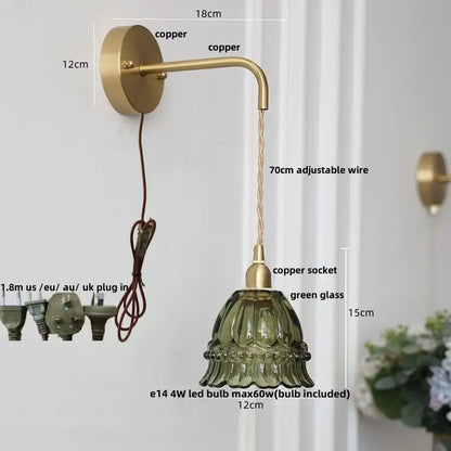 A vintage-style wall light with brass copper finish, green amber glass led shade, and adjustable 70cm wire for decorbites