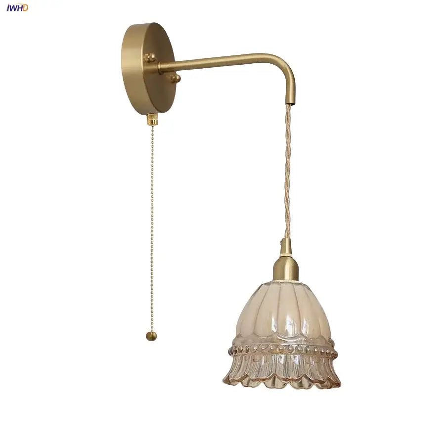 Antique brass finish wall light with frosted ruffled glass shade featuring decorbites amber glass led design for bedroom
