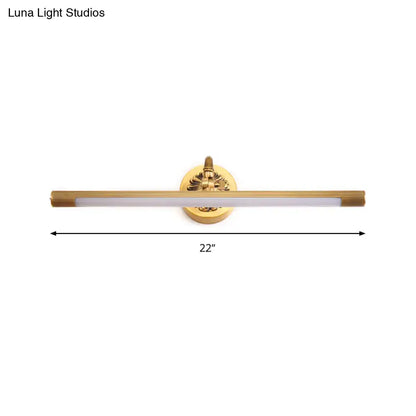 Modern antique brass integrated led wall light with gold finish and decorative circular base for bathroom vanity use