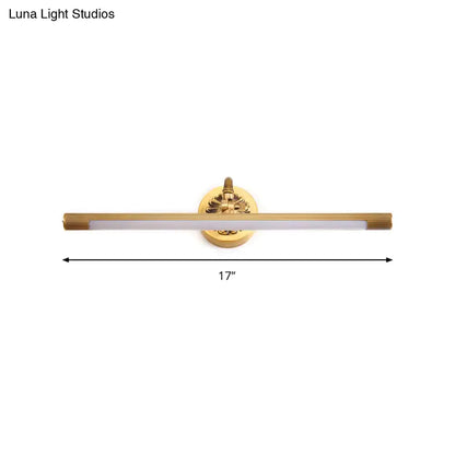 Modern antique brass integrated led wall light with gold finish and circular base for bathroom vanity lighting