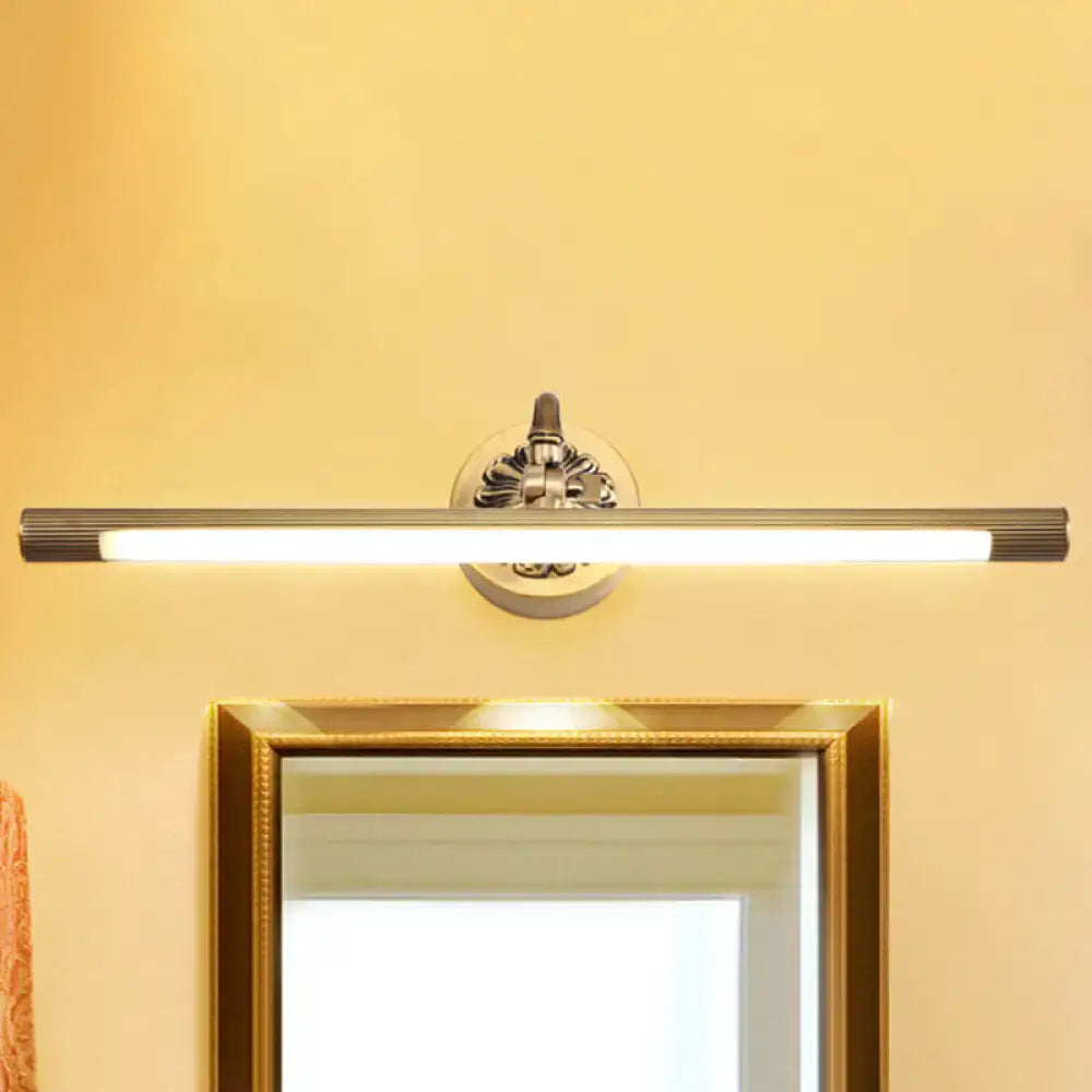 Silver ornate wall light with brass finish integrated led rectangular ribbed bar and decorative floral center plate