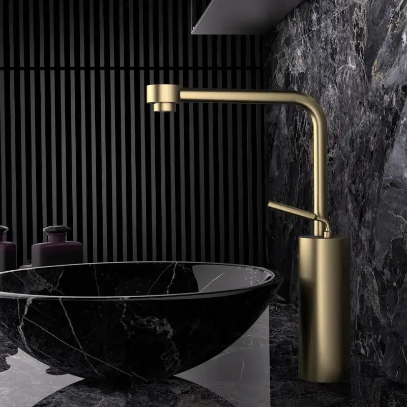 Modern antique bronze curved brass faucet with sleek waterfall spout and cylindrical base for bathroom fixture