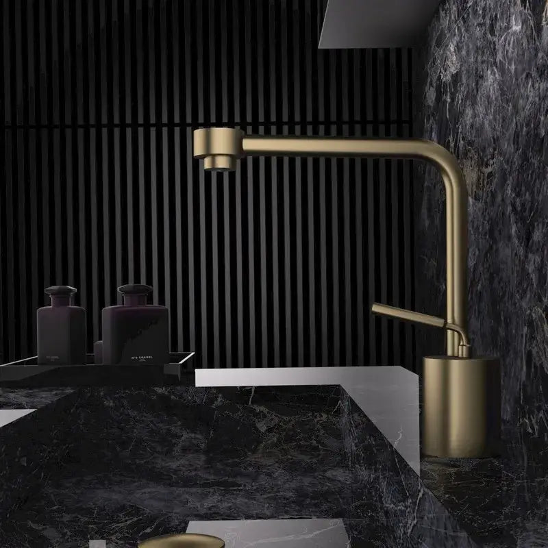 Modern antique bronze curved brass faucet with gold-toned brushed metal finish and sleek design for bathroom use