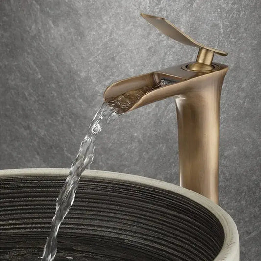 Modern antique bronze waterfall mixer faucet with brass finish and sleek design for bathroom cold water use
