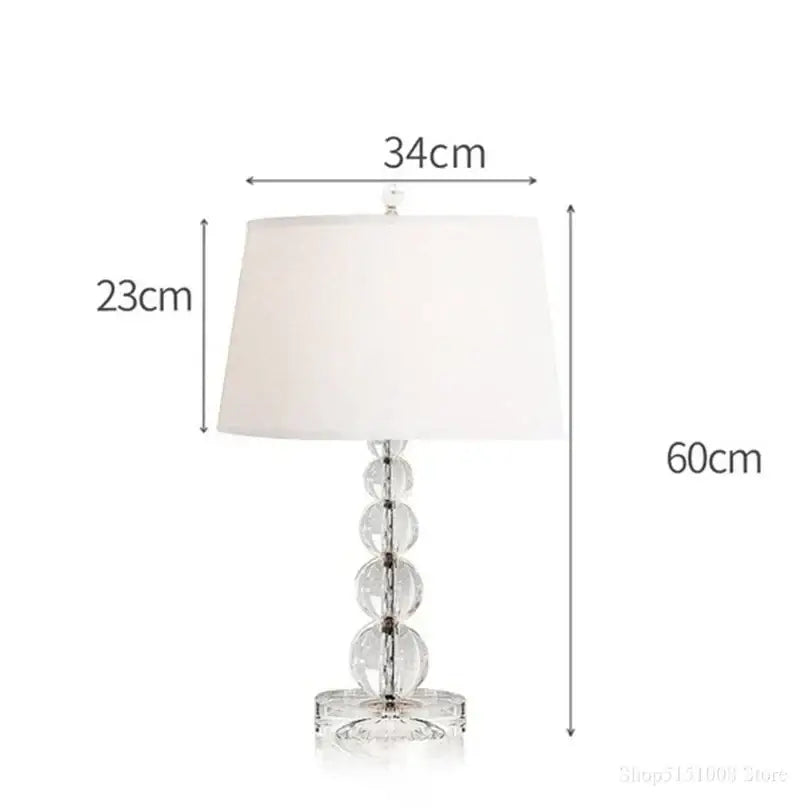 Elegant modern art deco crystal ball table lamp with white fabric shade and stacked glass beads decorbites crystal ball