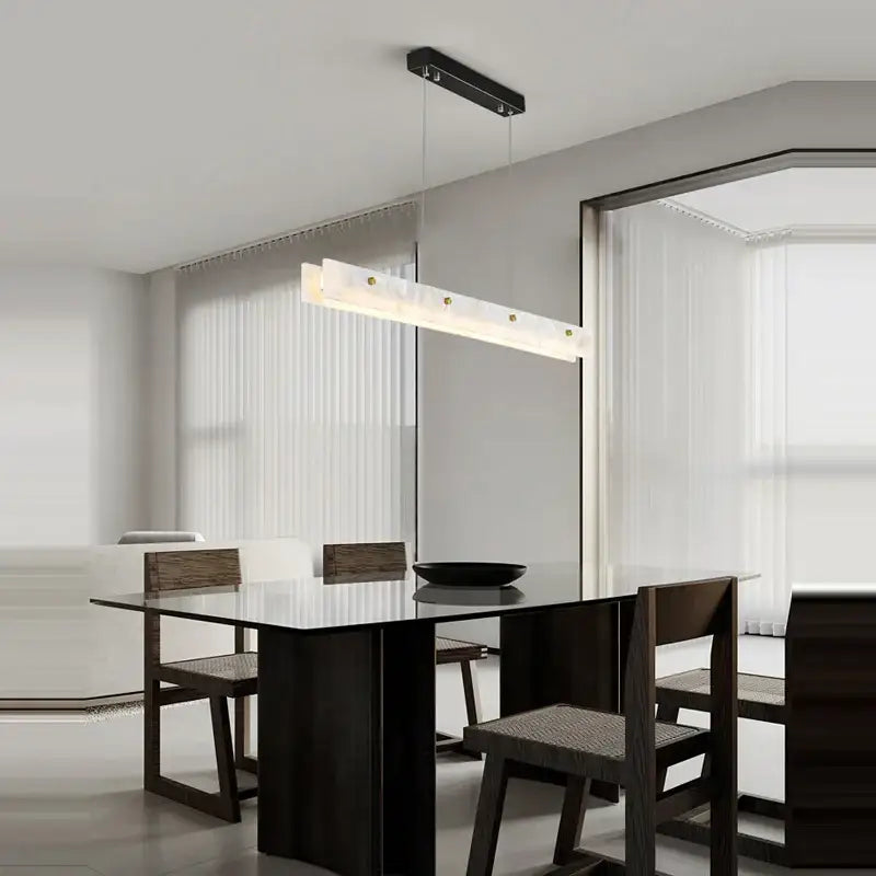 Modern art deco marble steel chandelier with black metal frame frosted glass diffuser and gold-toned fixtures for dining room decorbites art deco