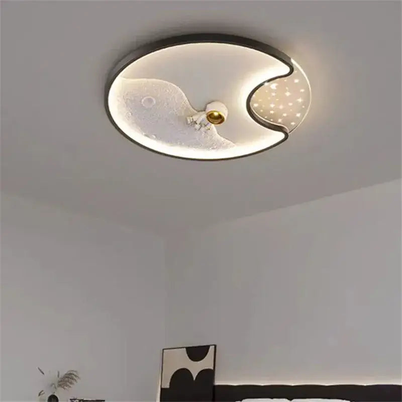 Modern oval ceiling light with black frame featuring moon surface and starred design for kids bedroom decorbites astronaut moonlight