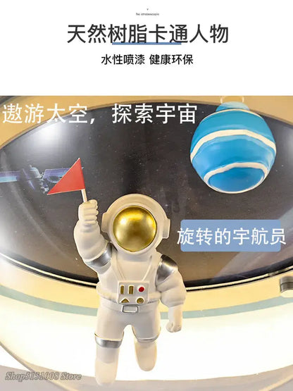 White astronaut spaceman planet ceiling lamp with gold visor and silver accents holding red flag for kids bedroom light
