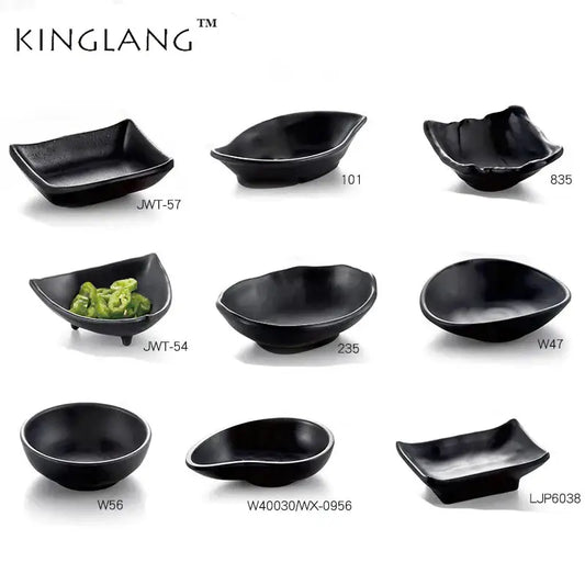 Modern asymmetrical black melamine plastic dipping sauce bowls by decorbites in various shapes and sizes for sushi or appetizers